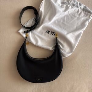 JW PEI Black Crescent Bag with Gold Details